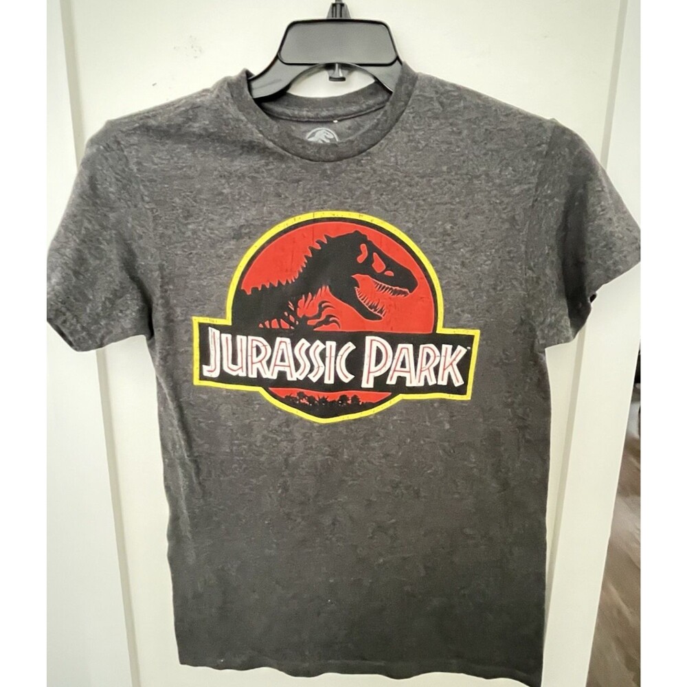 Jurassic Park Movie Logo T shirt Size SFeatures T-Rex In Cracked Ink Look Logo